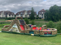 Piepūšamo atrakciju noma Piepūšamā atrakcija militārā Stafete